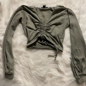 Army Green Long Sleeve Crop. Forever XXI brand. Size M. Cute Ruching on front.